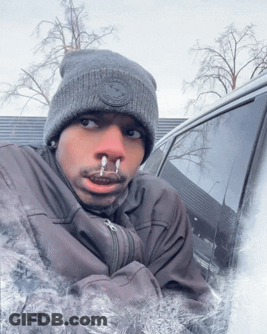 Man In Beanie With Ice Coming Out Of Nose And Mouth GIF