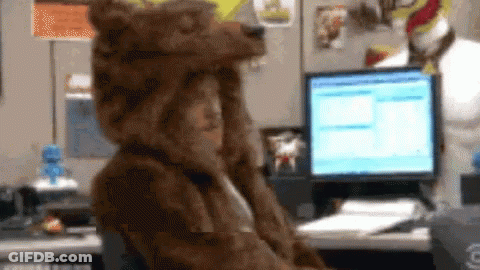 Man In Bear Costume Sitting At Computer GIF