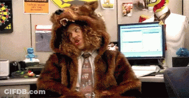 Man In Bear Costume Sitting At Computer GIF