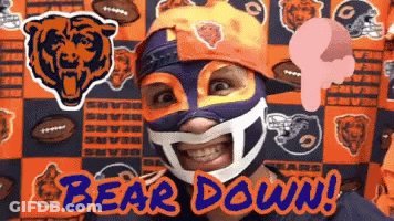 Man In Bear Mask In Front Of Bear Backdrop GIF