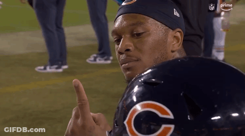 Man In Bears Helmet Giving Middle Finger On Football Field GIF