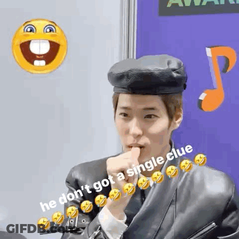 Man In Beret And Leather Jacket Holding Thumb To Mouth GIF