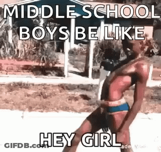 Man In Bikini Standing On Sidewalk GIF