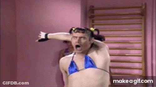 Man In Bikini Top Making Funny Face GIF