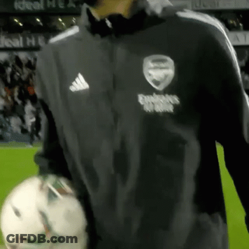 Man In Black Adidas Jacket Holding Soccer Ball GIF