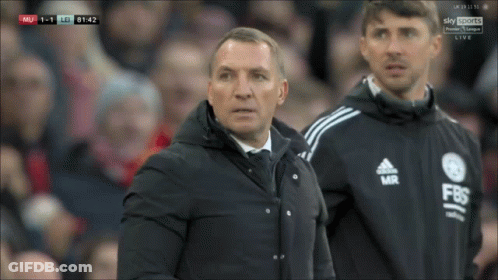 Man In Black Adidas Jacket Next To Another Man GIF