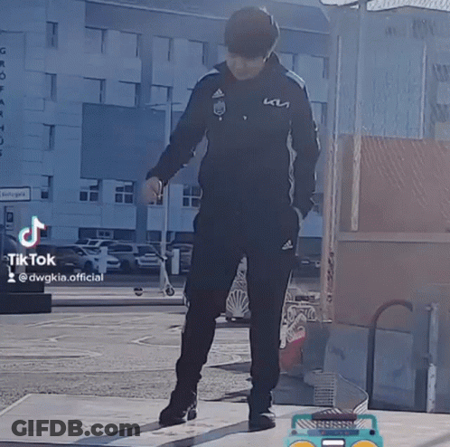 Man In Black Adidas Jacket Next To Boombox GIF