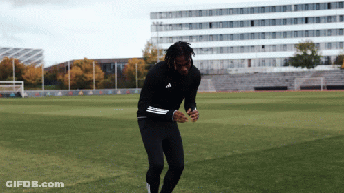 Man In Black Adidas Shirt On Field GIF