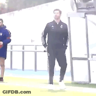 Man In Black Adidas Tracksuit On Soccer Field GIF