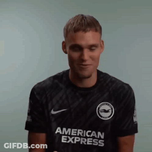 Man In Black American Express Shirt Smiling GIF