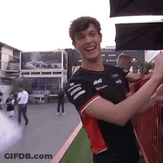 Man In Black And Red Shirt Giving High Five GIF