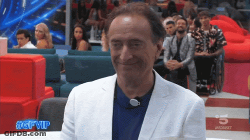 Man In Black And Red Shirt With Left Triangle GIF