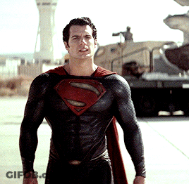 Man In Black And Red Superman Costume GIF
