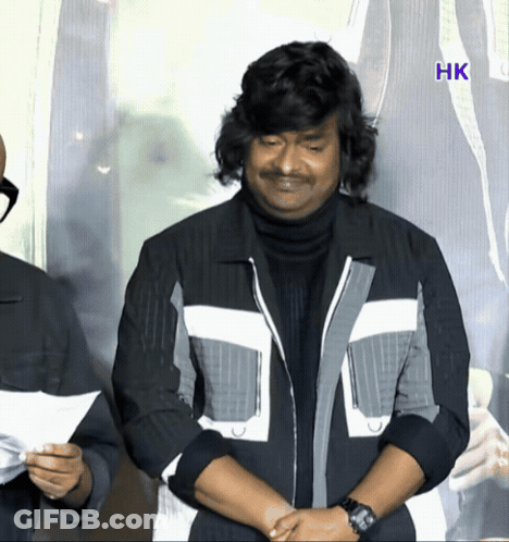 Man In Black And White Jacket Before HK Sign GIF