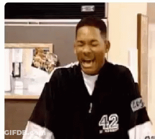 Man In Black And White Jacket Number 42 Laughing GIF