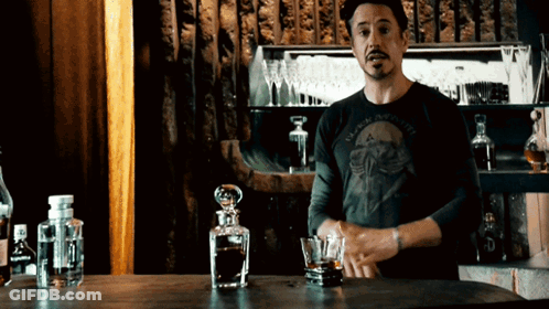 Man In Black And White Shirt At Bar GIF