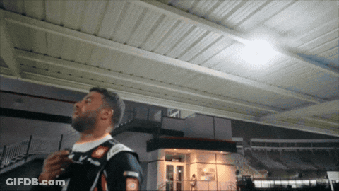 Man In Black And White Shirt With Letter V GIF