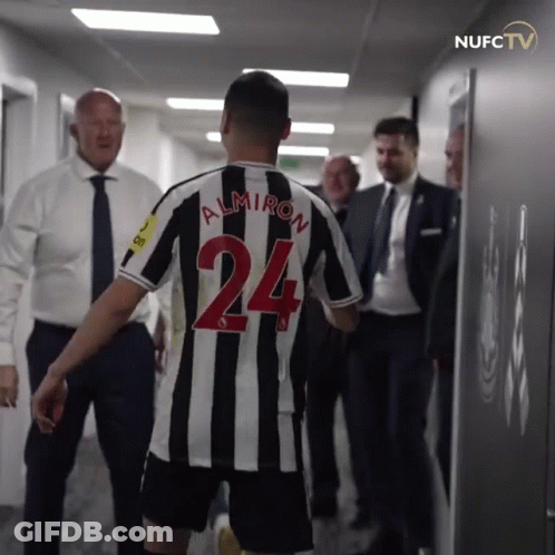 Man In Black And White Striped Jersey Number 24 GIF