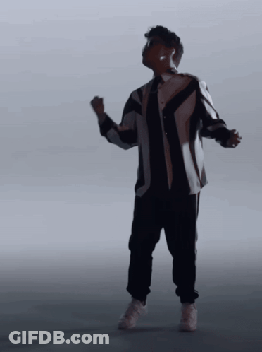 Man In Black And White Striped Shirt Dancing GIF