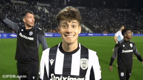 Man In Black And White Striped Shirt Saying Stoixima GIF
