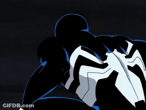 Man In Black And White Suit With Spider GIF