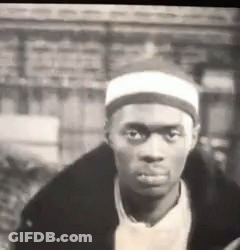 Man In Black And White With White Headband And Black Jacket GIF