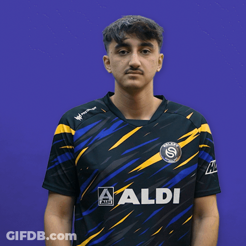 Man In Black And Yellow Aldi Shirt GIF