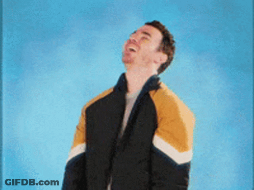 Man In Black And Yellow Jacket Making Funny Face GIF