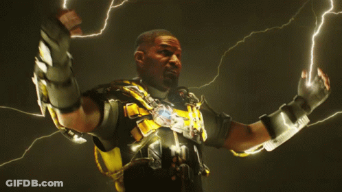 Man In Black And Yellow Suit Surrounded By Lightning Bolts GIF