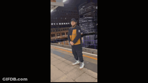 Man In Black And Yellow Timberland Jacket GIF