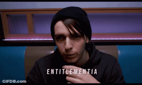 Man In Black Beanie And Black Hoodie With Word Entitlementia GIF