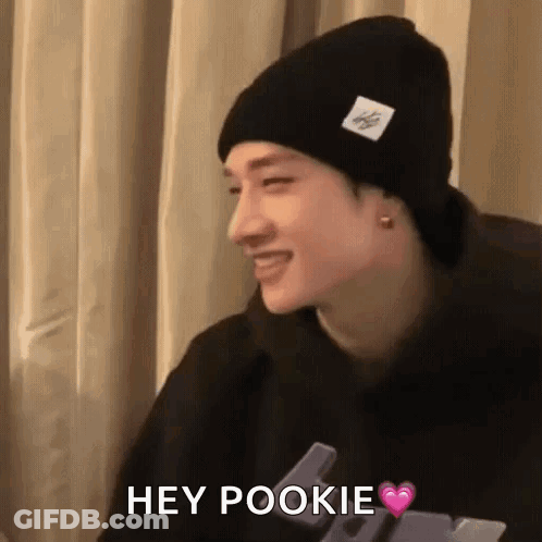 Man In Black Beanie And Hoodie Saying Hey Pookie GIF