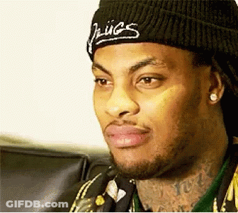 Man In Black Beanie With Juices GIF
