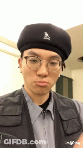 Man In Black Beret And Glasses Making Face GIF