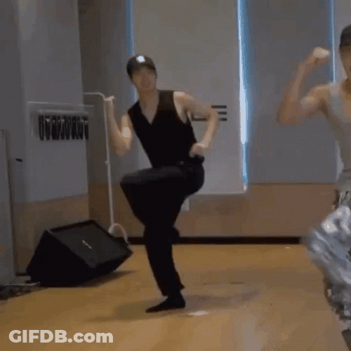 Man In Black Breakdancing GIF
