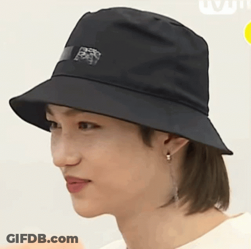Man In Black Bucket Hat With Sticker GIF