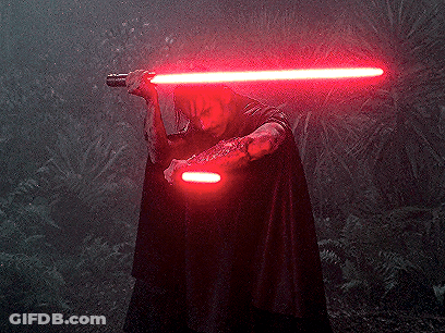 Man In Black Cape Holding Red Lightsaber GIF