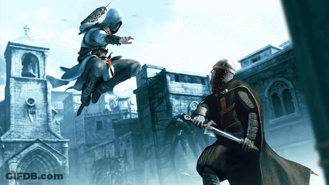 Man In Black Cape Holding Sword In Front Of Another Man GIF