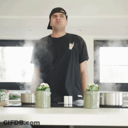 Man In Black Cat T-Shirt In Kitchen GIF