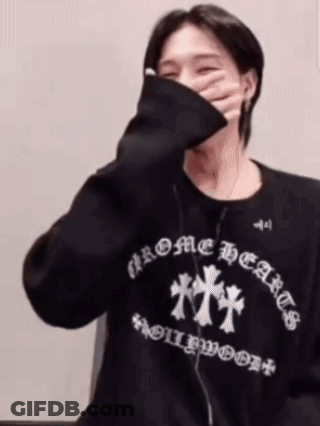 Man In Black Chrome Hearts Sweatshirt Covering Face GIF