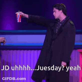 Man In Black Coat Holding Cup Saying Jd Uhhhh Juesday Yeah GIF