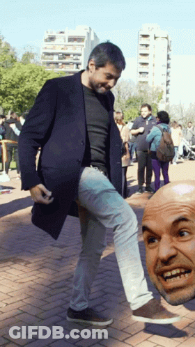 Man In Black Coat Kicks Another Man's Head GIF