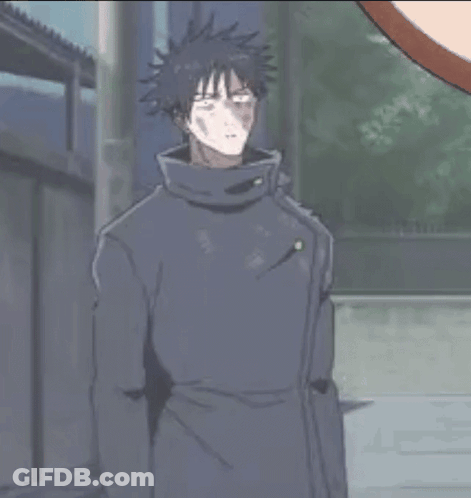 Man In Black Coat Looking At Building GIF