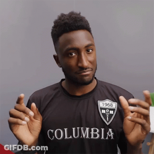 Man In Black Columbia Shirt With 1968 GIF