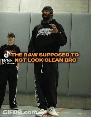 Man In Black Eagles Hoodie With TikTok Logo GIF