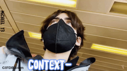 Man In Black Face Mask With Context GIF