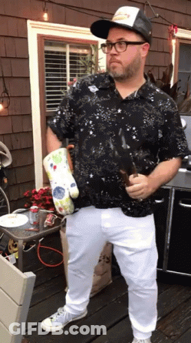 Man In Black Galaxy Shirt Holding Beer GIF