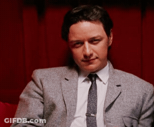 Man In Black Gloves Holding Hand To Ear GIF
