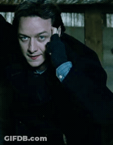 Man In Black Gloves Holding Hand To Ear GIF