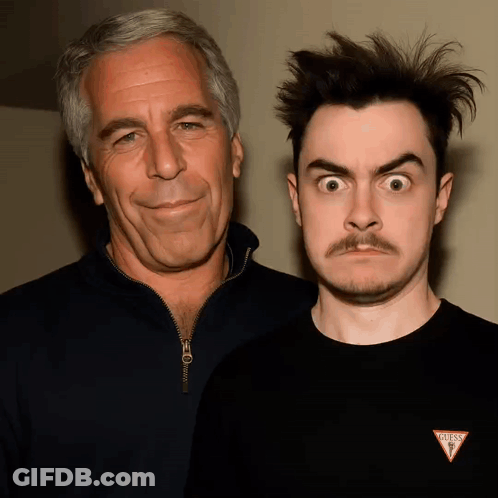 Man In Black Guess Shirt Next To Man With Mustache GIF